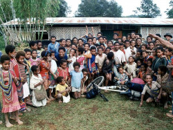 82 School house empties to gather around a cyclist 800