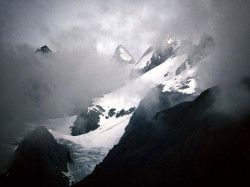 35 Mountain peaks peeking through the clouds in southern Chile 800