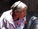 23 Elderly wwoman selling textiles in Solala