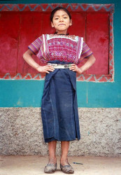 34 Young girl posing for the camera in a village north of Solala 800