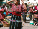 42 Woman carrying her goods on her head in Chichicastenango 800