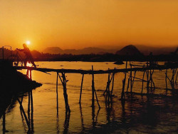 11 Sunsetting at a bamboo bridge crossing the Mekong River in Thailand 800