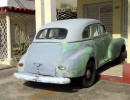 1940 ford 4 door coupe in a carport in cienfuegos 800