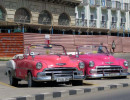 paiar of early 1950 s chevy taxis in havana 800