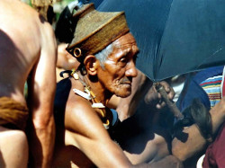 8 tribal elder smoking a cigar at an ifugao ceremony 800