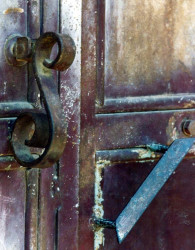 59iron knocker on a metal door in belize 800
