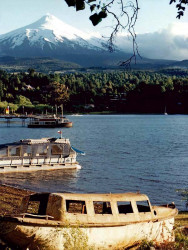 3 several boats in the foreground of volcano osorno in chile 800