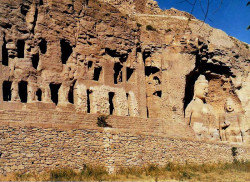10 buddhist complex carved out of a hillside 800