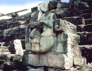 6 mayan face carved in the rocks of copan in honduras