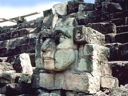 6 mayan face carved in the rocks of copan in honduras
