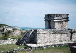 2 mayan temple over looking the caribbean sea